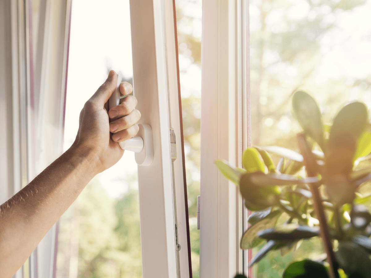 Opening a window in norwich UPVC white frame